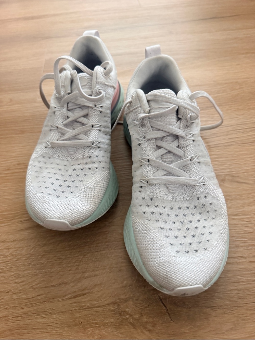 Nike Infinity Run FlyKnit Running Sneakers with Mint Accent